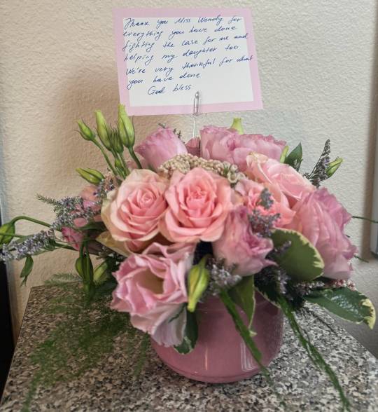 Photo of flower bouquet sent as thank you to attorney Wendy Pfau after winning disability case